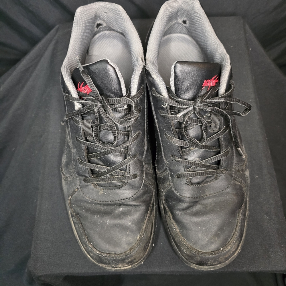Used well worn black Aggressor shoes